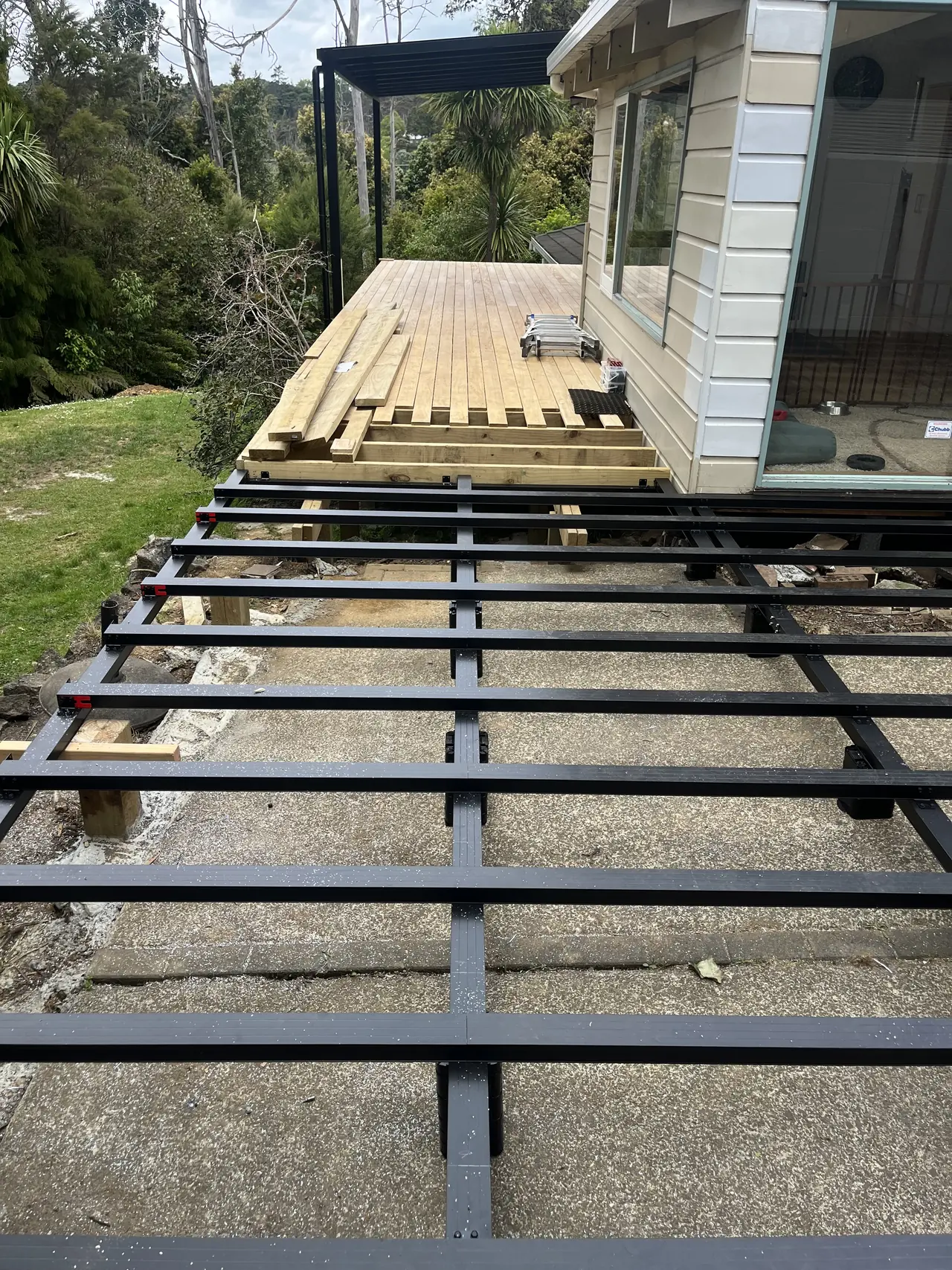 Aluminium deck frame over a garden