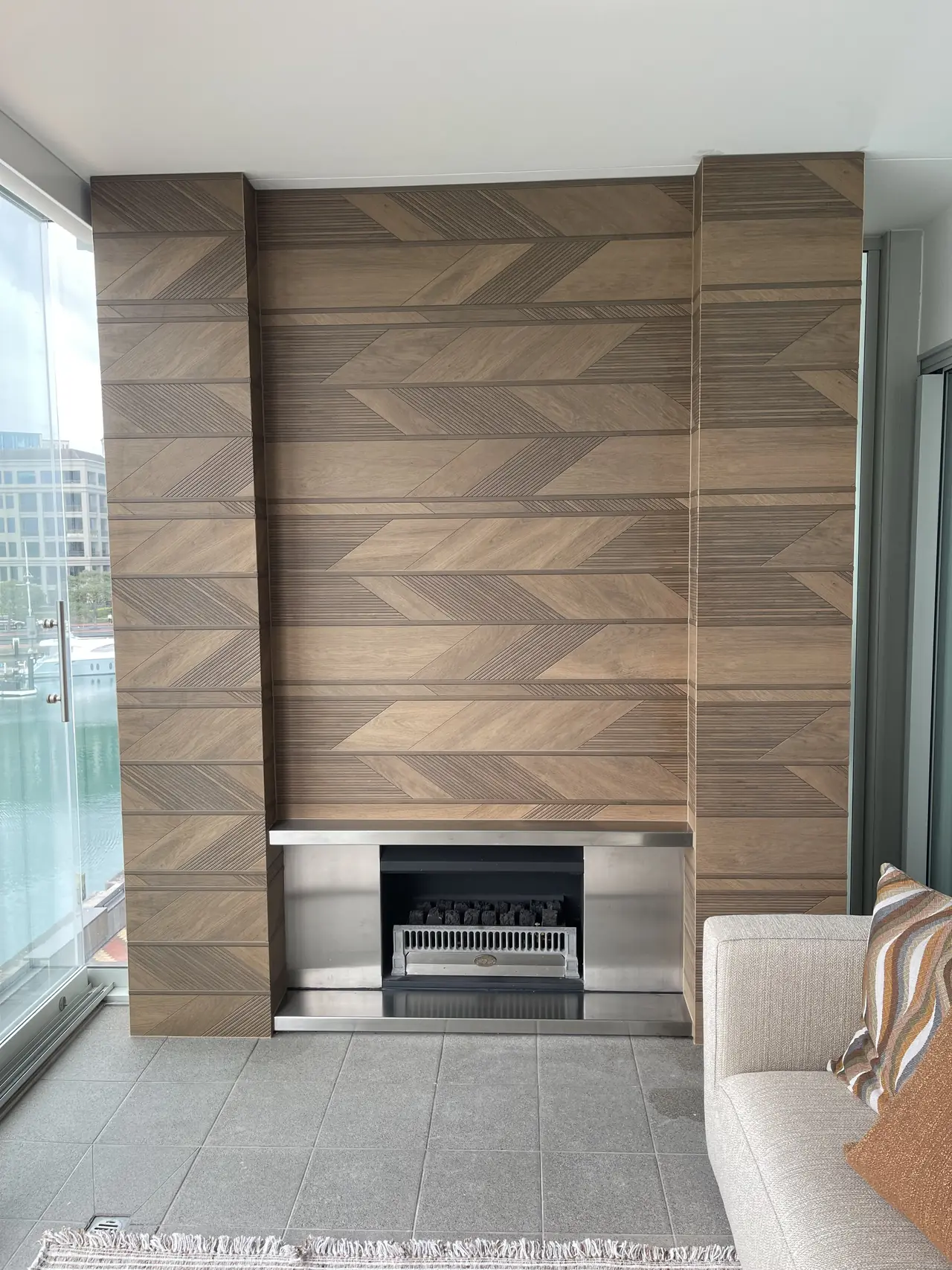 Chevron timber-look tile feature wall and fireplace