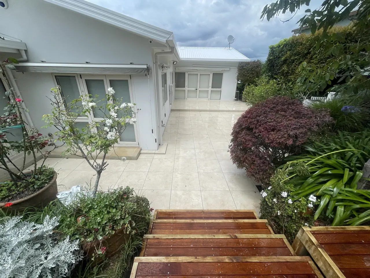 Garden patio with tiled steps