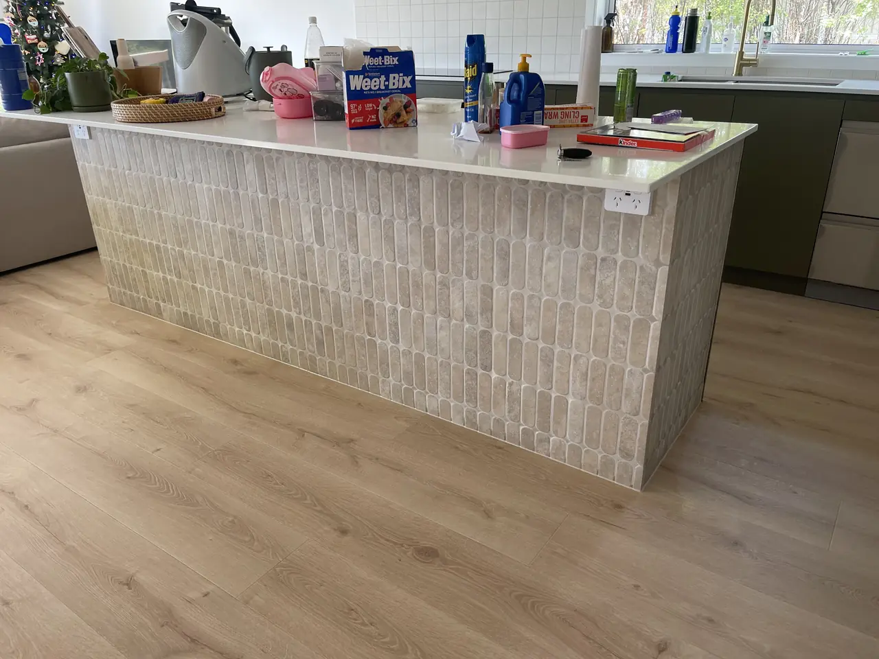 Finger-tile clad kitchen island