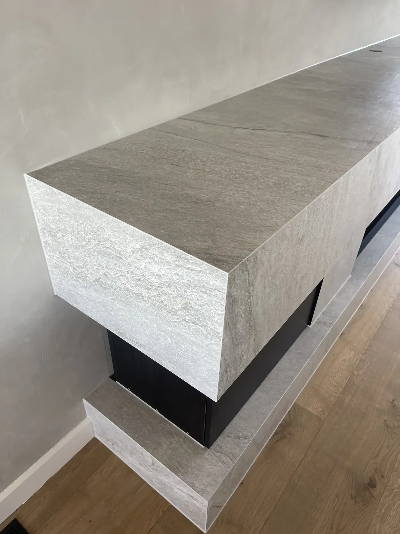 Mitred large format slab fireplace